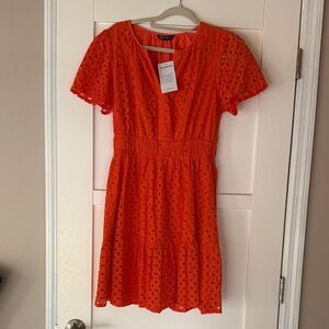 Gorgeous orange eyelet dress from PrettyGarden. Size small